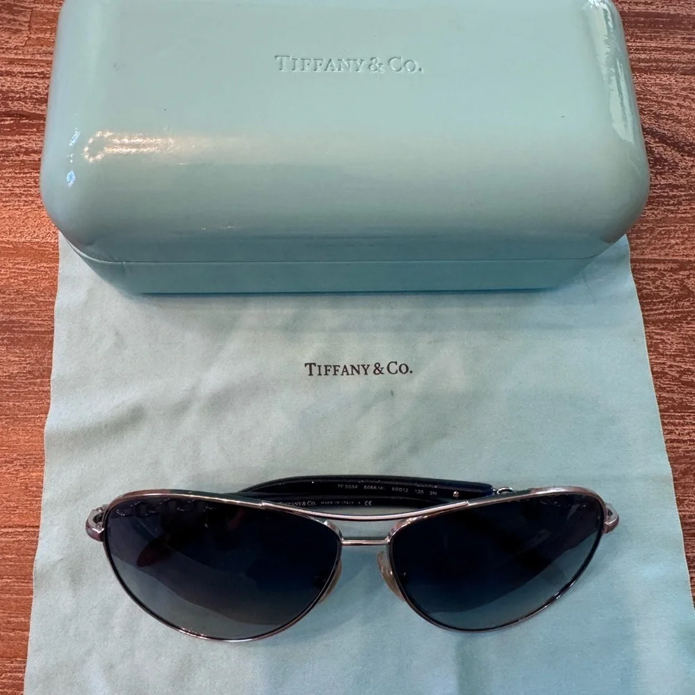 Tiffany aviator blue sunglasses. Slightly used good condition.